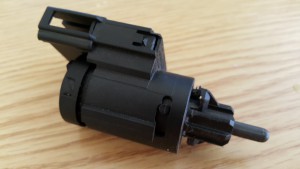 OEM brake switch from an Audi A6 C5 with locking lug in the fitted position, i.e. after rotating clockwise.