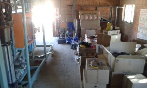 Boxes of tools and equipment for rehabilitating and upgrading Tsabong village reverse osmosis water treatment plant.