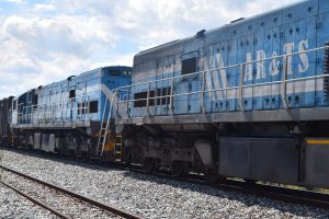 Ex-Queensland Railways class 2600, units 2609 and 2606, owned by African Rail & Traction Services passing through Botswana with grain wagons.